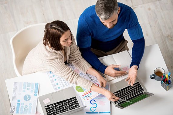 Marketing team reviewing SEO strategy